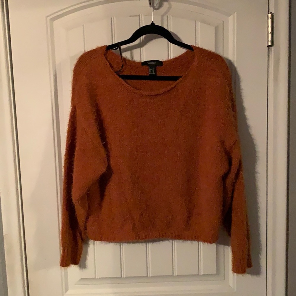 Fuzzy orange sweater